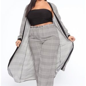 Matching free flowing pants and duster set.